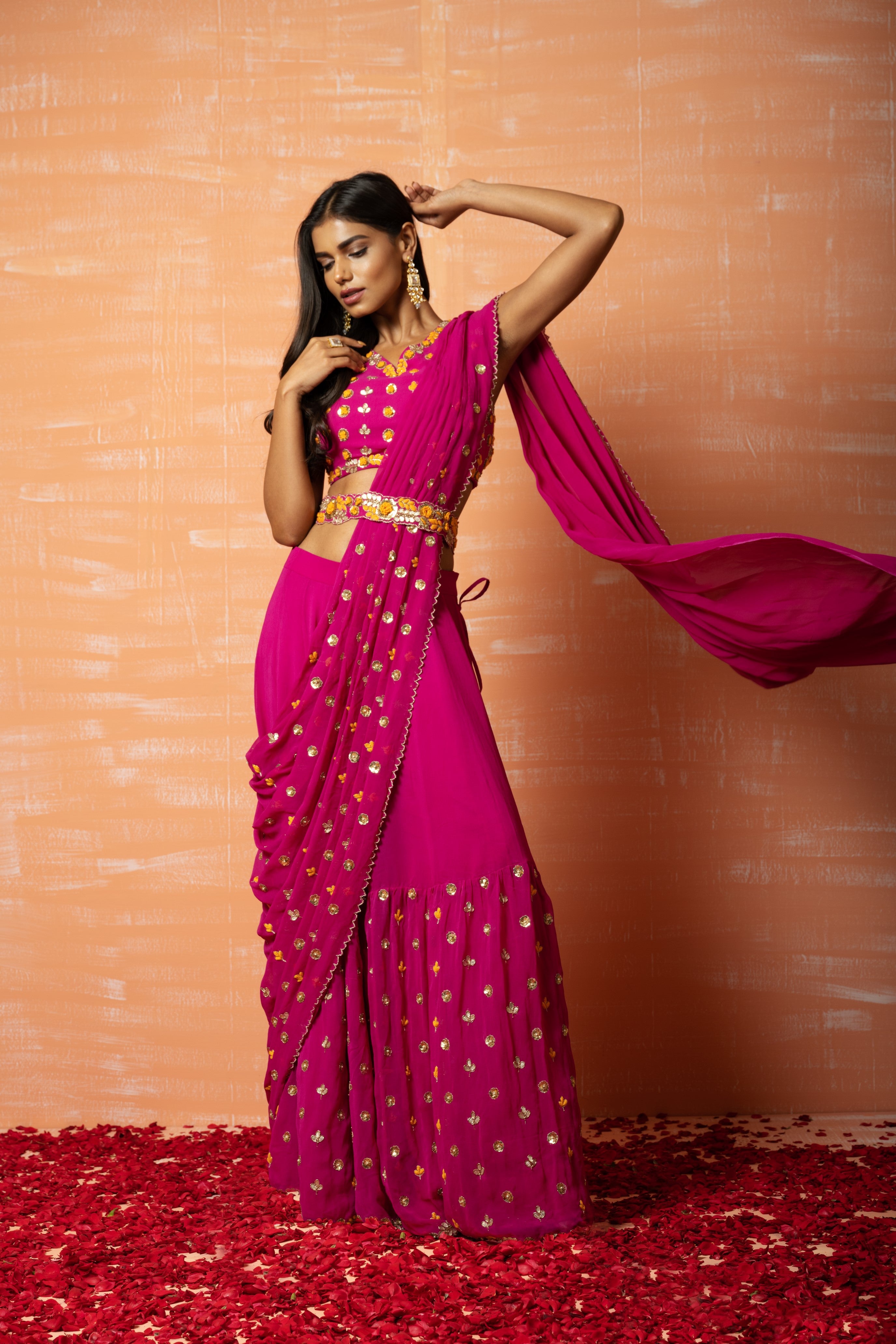 Purple pre-stitched sharara saree set with intricate embroidery and a matching belt.