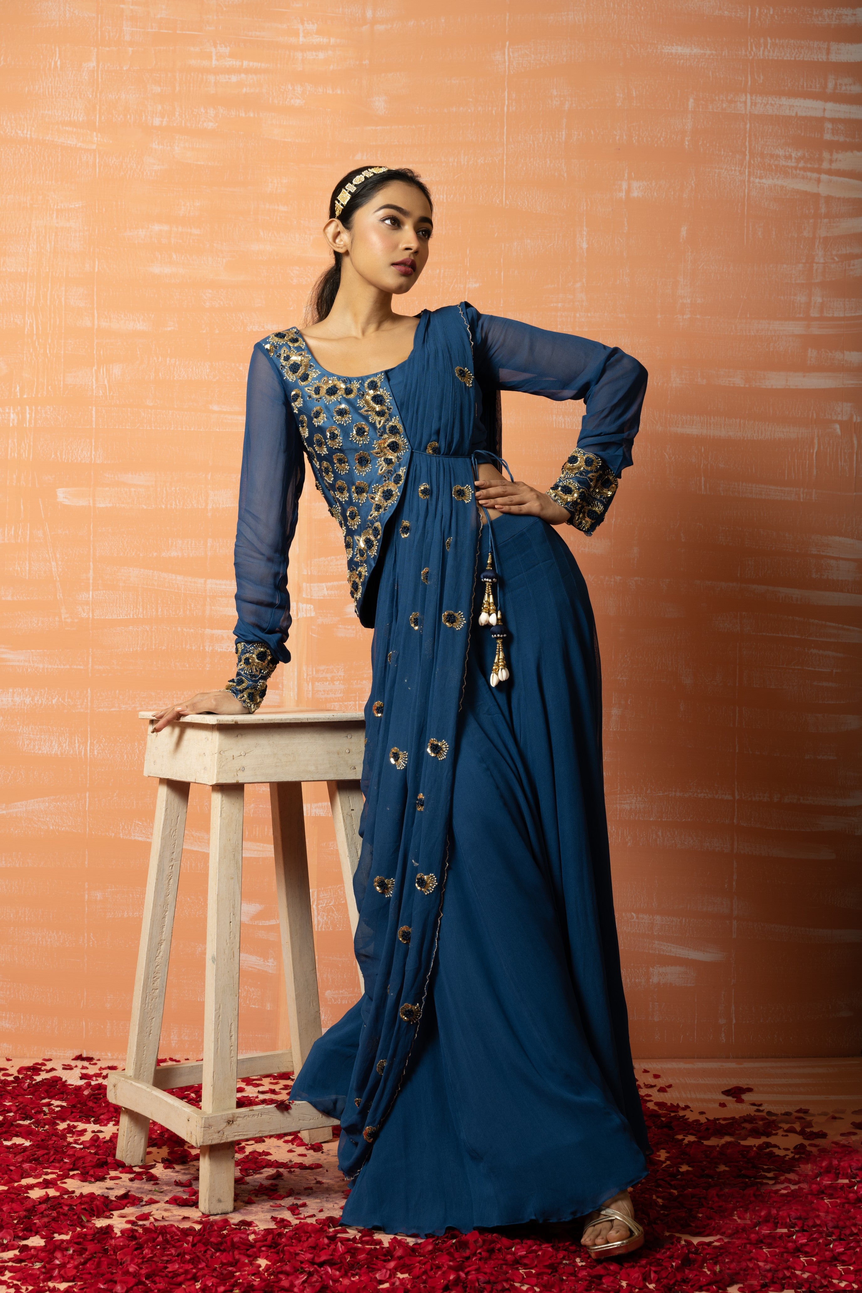 Blue sharara saree with a hand-embroidered jacket in georgette fabric.