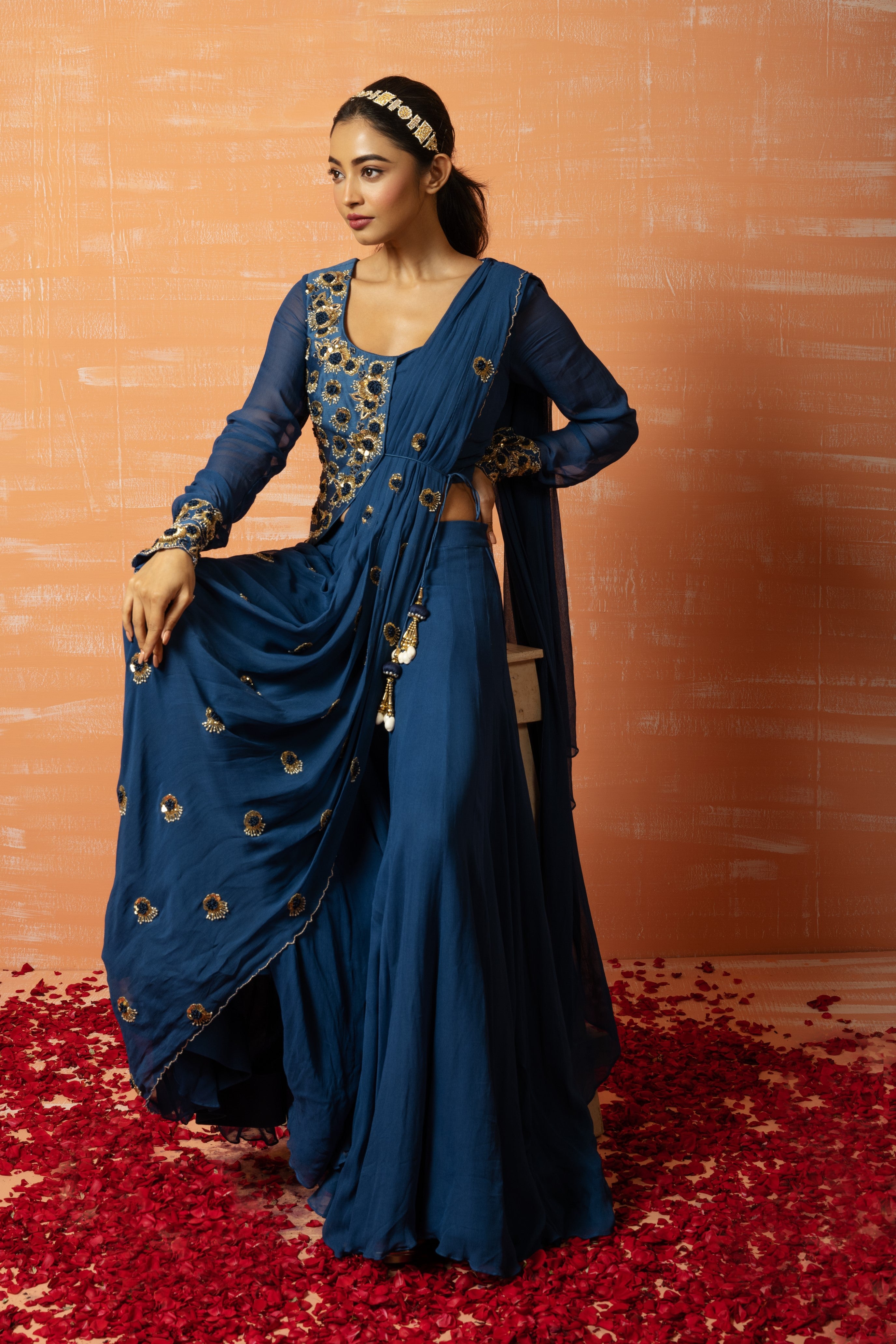 Blue sharara saree with a hand-embroidered jacket in georgette fabric.