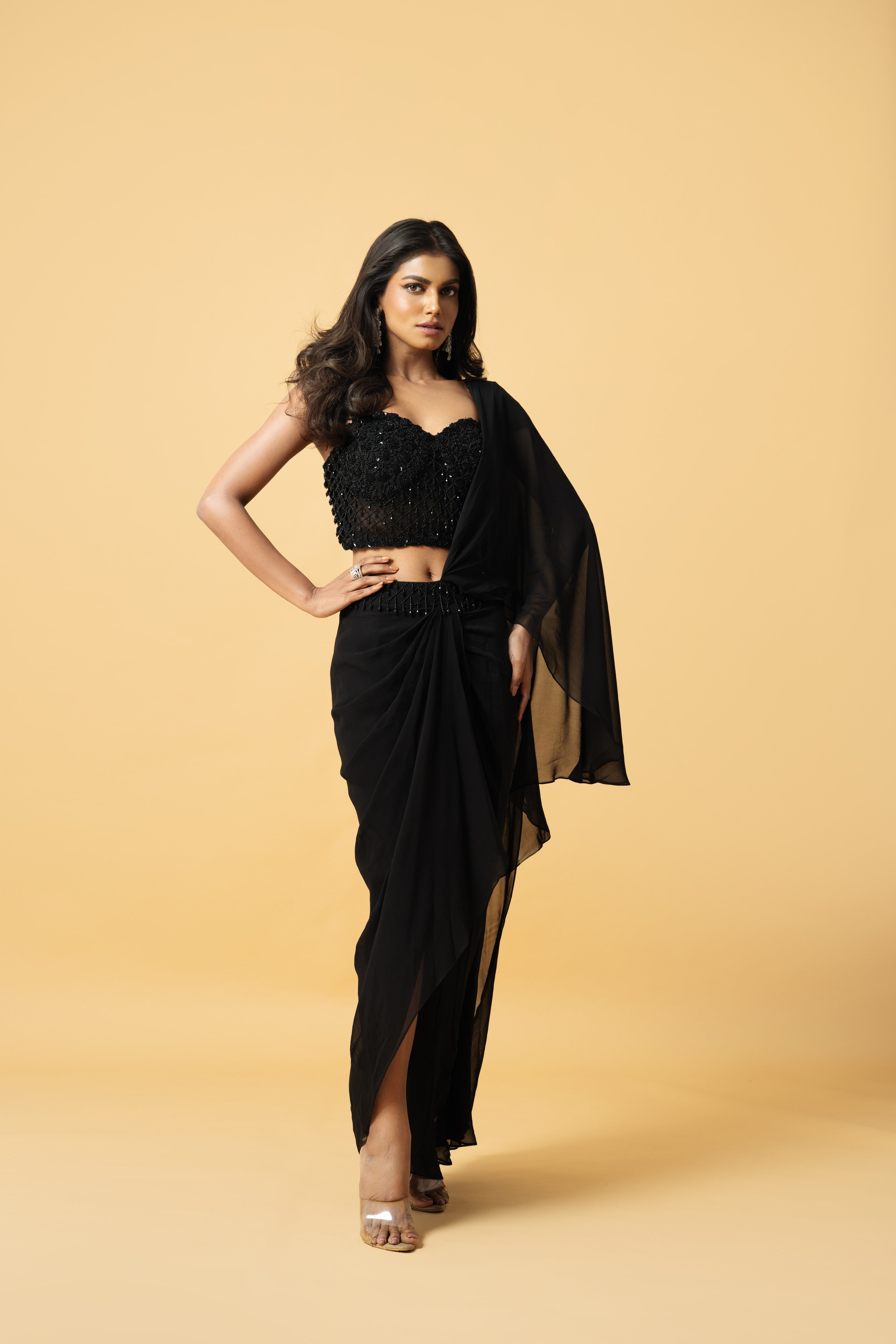 Black georgette saree with a corset-style hand-embroidered blouse.